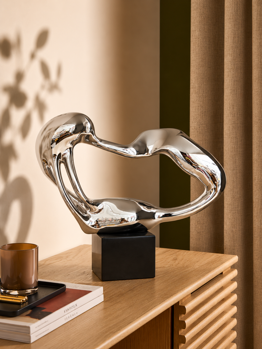 Irregular Circular Chrome with Black Marble Base