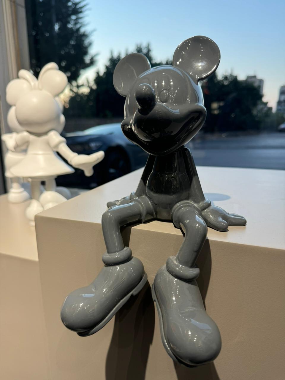 Mickey Sitting on a Shelf