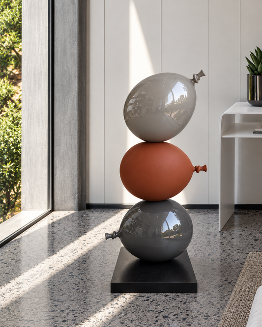 Balloons Stacked on a Black Marble Base